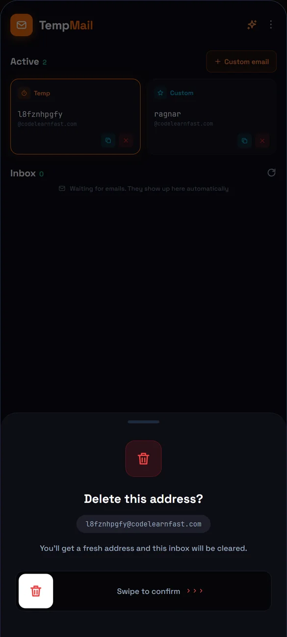 The delete confirmation in TempMail, asking you to swipe to remove the address and clear its inbox